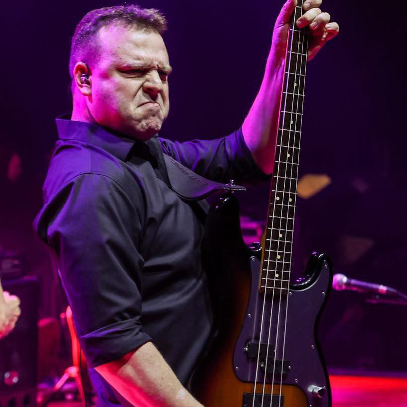 SYNKD bassist performing live